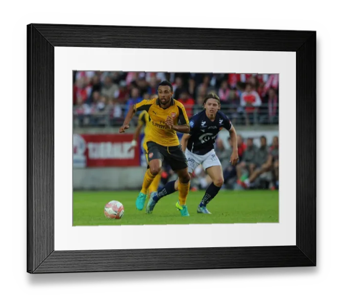 Framed Print : Coquelin vs Ryerston: A Football Battle - Arsenal's Coquelin Holds Off Viking's Ryerston during Pre-Season Clash Framed Print : Coquelin vs Ryerston: A Football Battle - Arsenal's Coquelin Holds Off Viking's Ryerston during Pre-Season Clash