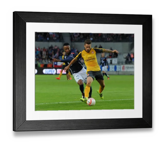 Framed Print : Debuchy vs Adegbenro: A Clash in Pre-Season Friendly Between Viking FK and Arsenal