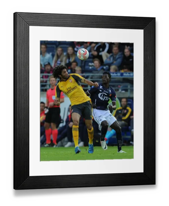 Framed Print : Clash of the Midfielders: Mohamed Elneny vs. Samuel Adegbenro (Viking FK vs. Arsenal, 2016) Framed Print : Clash of the Midfielders: Mohamed Elneny vs. Samuel Adegbenro (Viking FK vs. Arsenal, 2016)