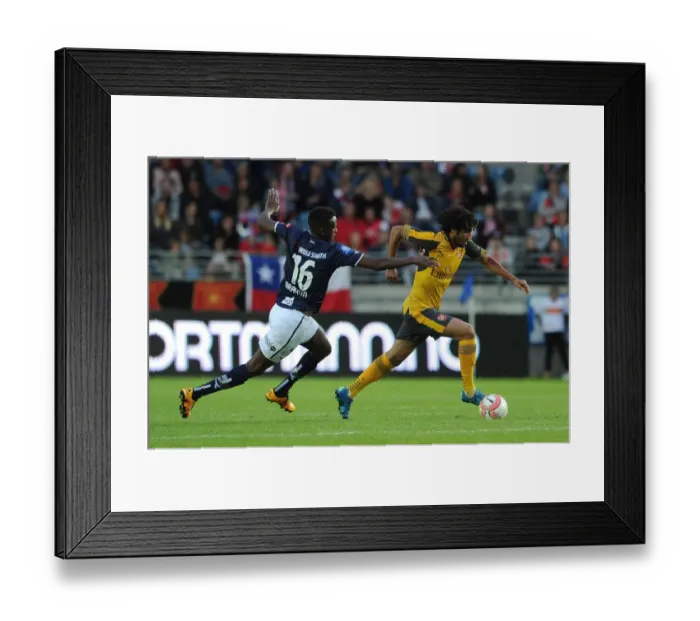 Framed Print : Clash of Midfield Titans: Elneny vs. Ibrhim in Arsenal's Pre-Season Battle against Viking FK