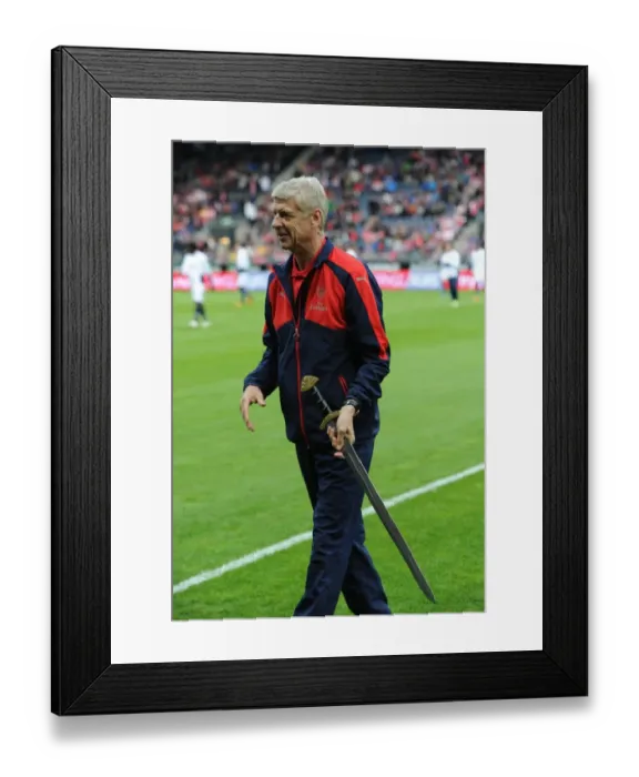 Framed Print : Arsene Wenger Honored with Viking Sword before Arsenal's Pre-Season Match in Norway (2016) Framed Print : Arsene Wenger Honored with Viking Sword before Arsenal's Pre-Season Match in Norway (2016)