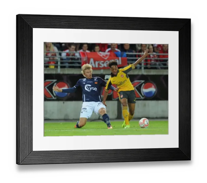 Framed Print : Willock vs Steen: A Clash in Pre-Season Friendly between Viking FK and Arsenal