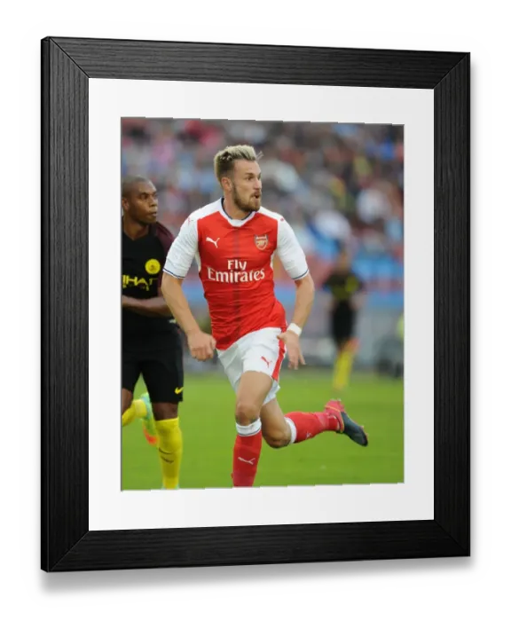 Framed Print : Arsenal's Aaron Ramsey Faces Manchester City in 2016: A Pre-Season Showdown in Gothenburg