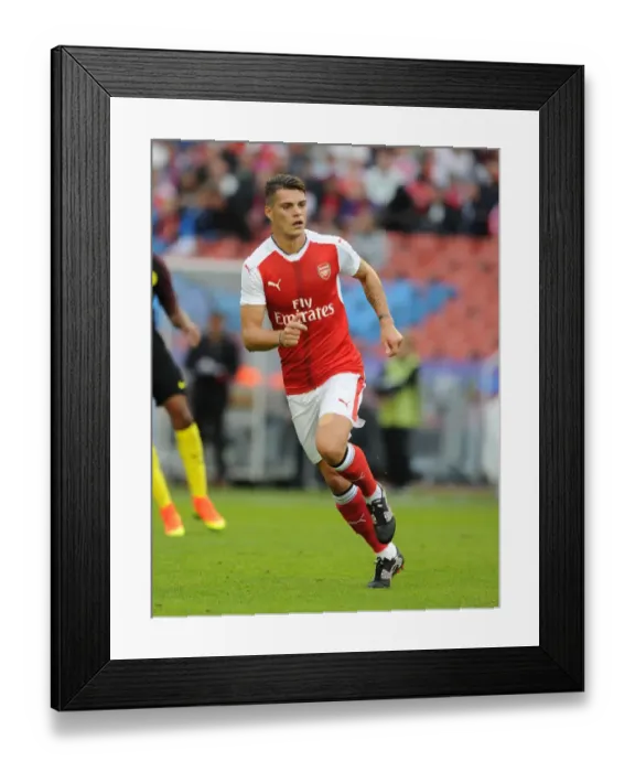 Framed Print : Granit Xhaka Faces Manchester City: Arsenal's Star Midfielder in 2016 Pre-Season Clash