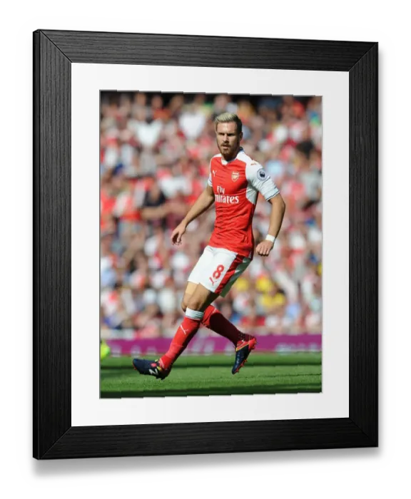 Framed Print : Arsenal's Aaron Ramsey in Action Against Liverpool (2016-17) at the Emirates Stadium Framed Print : Arsenal's Aaron Ramsey in Action Against Liverpool (2016-17) at the Emirates Stadium