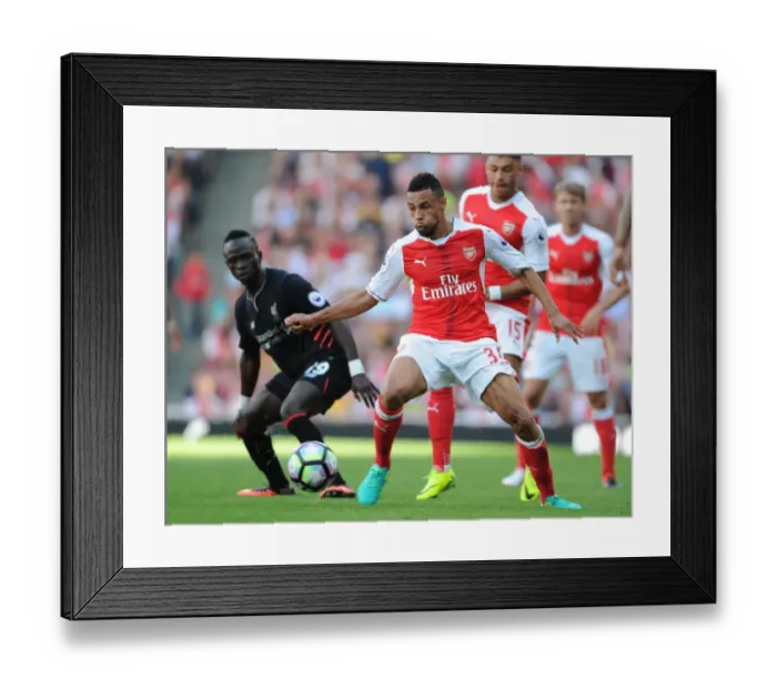 Framed Print : Coquelin vs. Mane: A Premier League Battle at Emirates Stadium (2016-17)