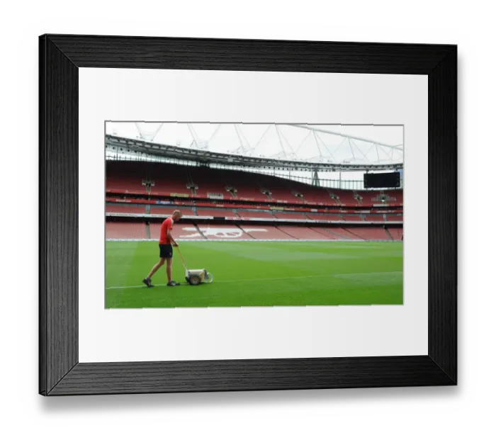 Framed Print : Preparing for the Arsenal vs Liverpool Battle: The Emirates Stadium Pitch Set for Premier League 2016-17 Clash