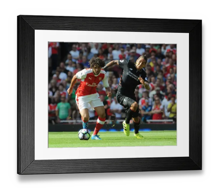 Framed Print : Arsenal vs. Liverpool Showdown: Elneny vs. Firmino, 2016-17 Premier League Clash at Emirates Stadium