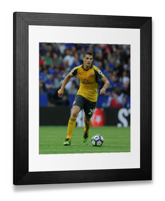 Framed Print : Granit Xhaka: Arsenal's Midfield Maestro Shines in Leicester Showdown, Premier League 2016-17 Framed Print : Granit Xhaka: Arsenal's Midfield Maestro Shines in Leicester Showdown, Premier League 2016-17