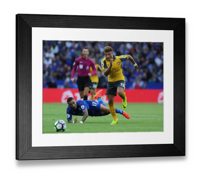 Framed Print : Oxlade-Chamberlain vs. Simpson: Intense Clash in Arsenal's Premier League Battle with Leicester (2016-17) Framed Print : Oxlade-Chamberlain vs. Simpson: Intense Clash in Arsenal's Premier League Battle with Leicester (2016-17)