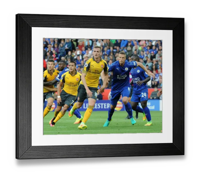 Framed Print : Clash of Titans: Holding vs. Huth - A Battle of Defenders in Leicester City vs. Arsenal, Premier League 2016-17