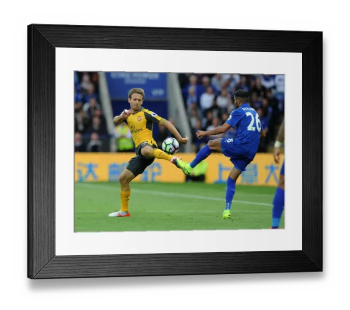 Framed Print : Clash of Wings: Monreal vs Mahrez - Premier League Showdown Framed Print : Clash of Wings: Monreal vs Mahrez - Premier League Showdown