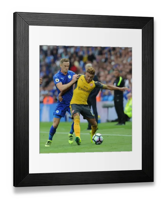 Framed Print : Clash of Midfielders: Oxlade-Chamberlain vs. King in Leicester City vs. Arsenal Premier League Match (2016-17)