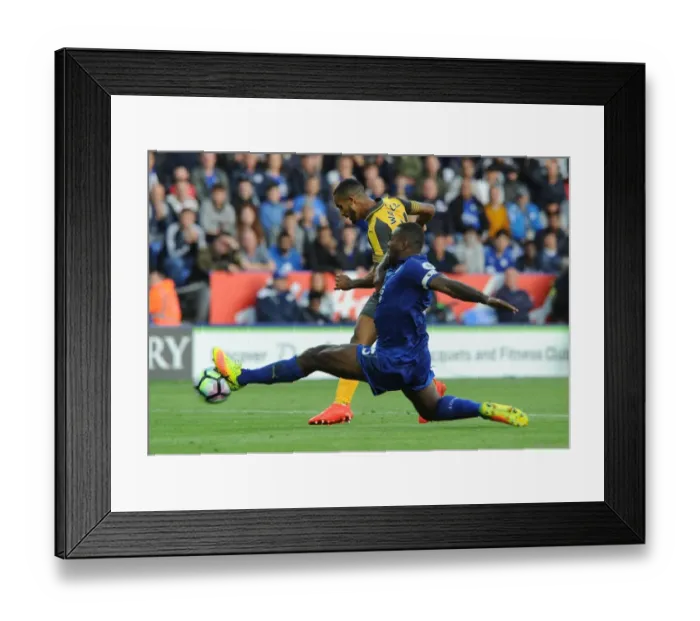 Framed Print : Clash at The King Power: Walcott vs Morgan - Arsenal vs Leicester City, Premier League 2016-17 Framed Print : Clash at The King Power: Walcott vs Morgan - Arsenal vs Leicester City, Premier League 2016-17