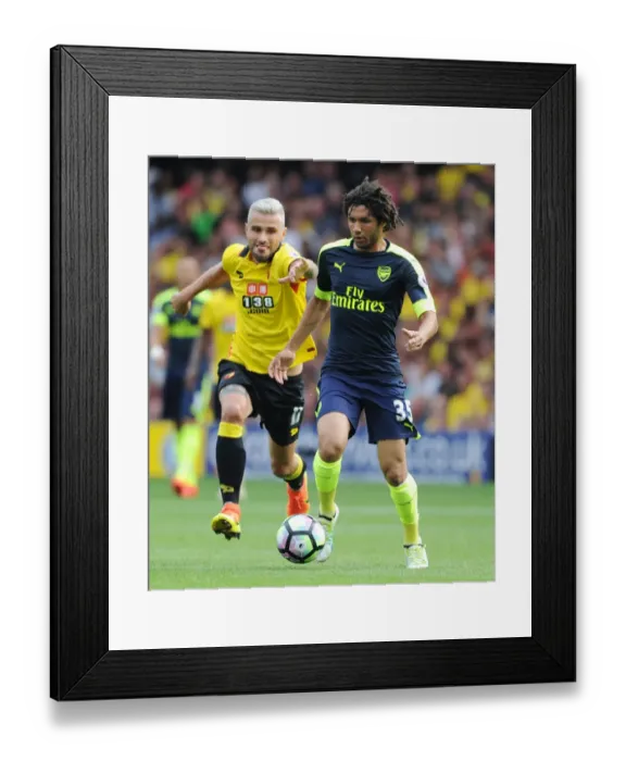 Framed Print : Mohamed Elneny Overpowers Valon Behrami: A Premier League Battle at Vicarage Road, 2016-17