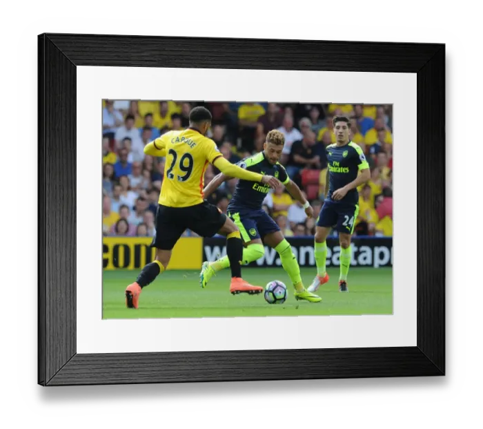 Framed Print : Clash at Vicarage Road: Oxlade-Chamberlain vs Capoue in Premier League Battle