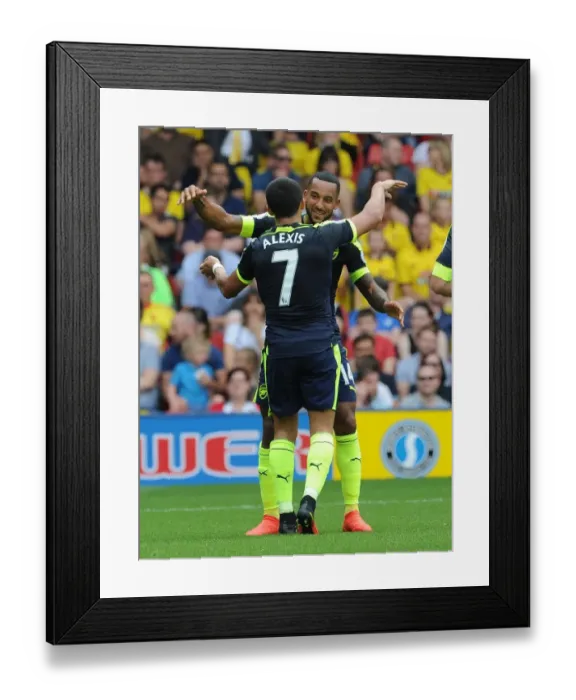 Framed Print : Arsenal's Unstoppable Duo: Sanchez and Walcott Celebrate Goals Against Watford (2016-17) Framed Print : Arsenal's Unstoppable Duo: Sanchez and Walcott Celebrate Goals Against Watford (2016-17)
