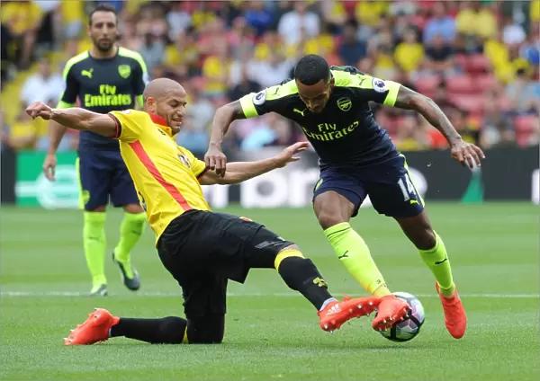 Theo Walcott vs. Adlene Guedioura: A Premier League Battle at Vicarage Road (Watford vs. Arsenal, 2016-17)