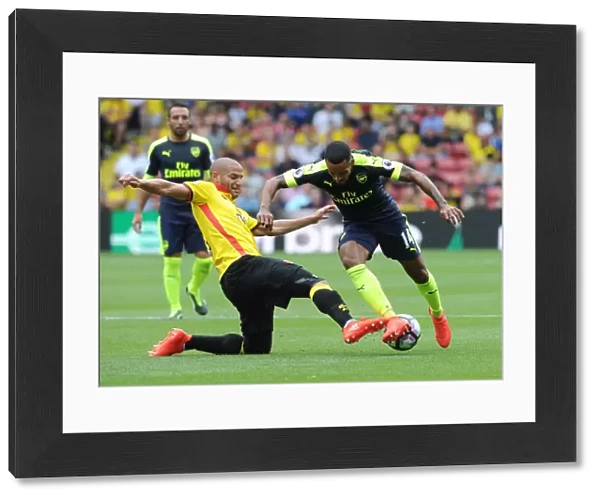 Theo Walcott vs. Adlene Guedioura: A Premier League Battle at Vicarage Road (Watford vs. Arsenal, 2016-17)