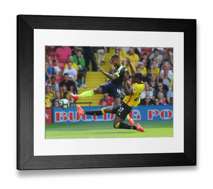 Framed Print : Theo Walcott vs Christian Kabasele: A Premier League Face-Off at Vicarage Road Framed Print : Theo Walcott vs Christian Kabasele: A Premier League Face-Off at Vicarage Road