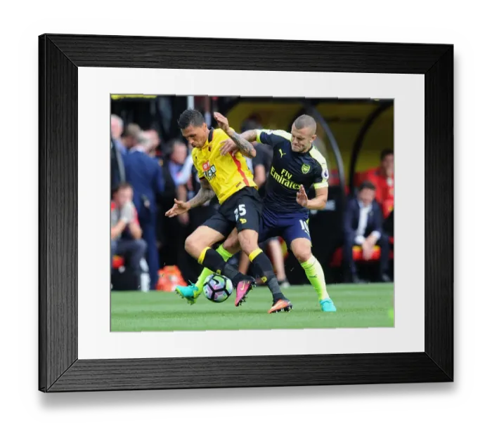 Framed Print : Intense: Wilshere's Crunching Tackle on Holebas Secures Arsenal's Victory (2016-17) Framed Print : Intense: Wilshere's Crunching Tackle on Holebas Secures Arsenal's Victory (2016-17)