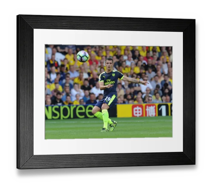 Framed Print : Granit Xhaka: Arsenal's Midfield Maestro in Action Against Watford, Premier League 2016-17 Framed Print : Granit Xhaka: Arsenal's Midfield Maestro in Action Against Watford, Premier League 2016-17