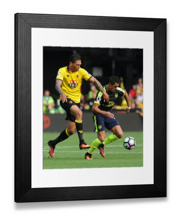 Framed Print : Alexis Sanchez (Arsenal) Jose Holebas (Watford). Watford 1: 3 Arsenal. Premier League Framed Print : Alexis Sanchez (Arsenal) Jose Holebas (Watford). Watford 1: 3 Arsenal. Premier League