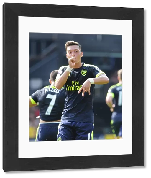 Mesut Ozil celebrates scoring Arsenals 3rd goal. Watford 1: 3 Arsenal. Premier League