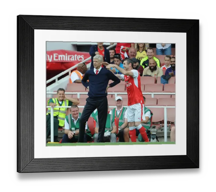 Framed Print : Arsenal Legends vs. AC Milan Glorie: A Playful Reunion - Keown's Mock Strangle of Wenger