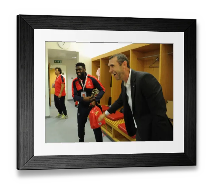 Framed Print : Arsenal Legends vs Milan Glorie: A Battle of Football Legends at Emirates Stadium