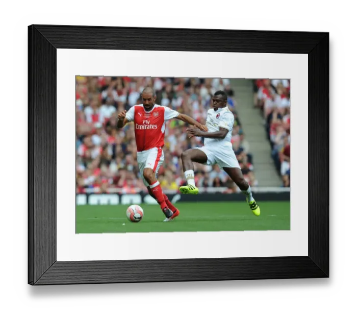 Framed Print : Arsenal Legends vs Milan Glorie: A Battle of Football Legends at Emirates Stadium