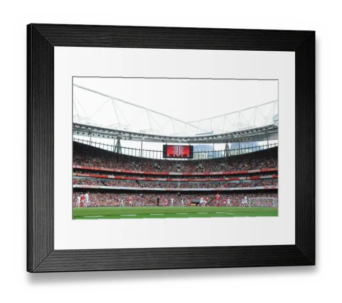 Framed Print : Arsenal vs Milan: A Clash of Football Legends at Emirates Stadium