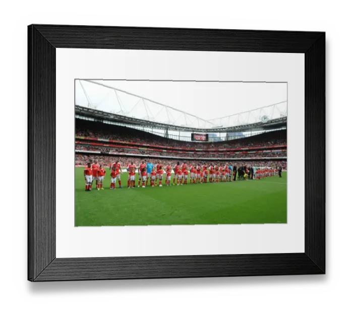 Framed Print : Arsenal Legends vs. Milan Glorie: A Football Clash at Emirates Stadium