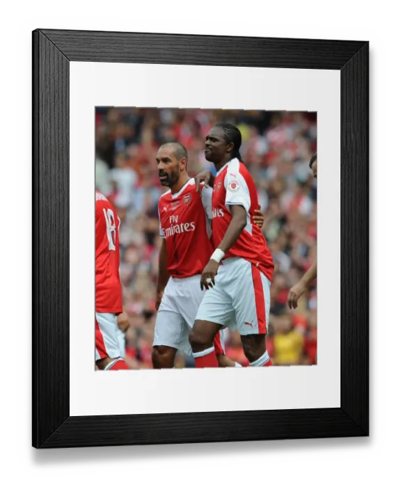 Framed Print : Arsenal Legends vs Milan Glorie: Kanu and Pires Unforgettable Goal Celebration at Emirates Stadium Framed Print : Arsenal Legends vs Milan Glorie: Kanu and Pires Unforgettable Goal Celebration at Emirates Stadium