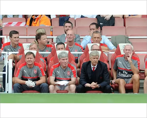 Arsene Wenger the Arsenal Manager on the bench with Gary Lewin (Physio), Pat Rice