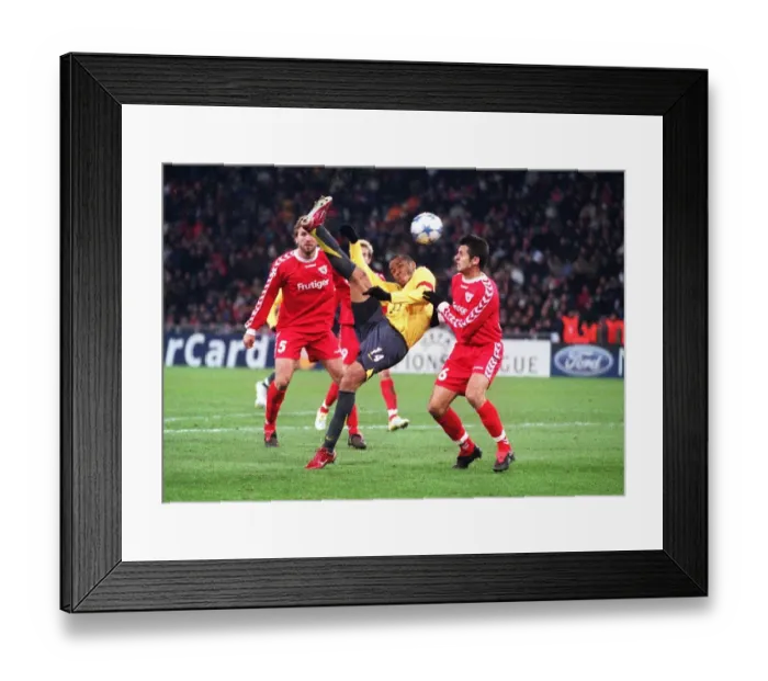 Framed Print : Thierry Henry's Goal Secures Arsenal's Victory Over FC Thun in UEFA Champions League Group Stage Framed Print : Thierry Henry's Goal Secures Arsenal's Victory Over FC Thun in UEFA Champions League Group Stage