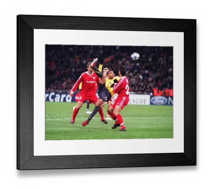 Framed Print : Thierry Henry's Unforgettable Goal: Arsenal's Triumph in UEFA Champions League Group B vs FC Thun, 2005