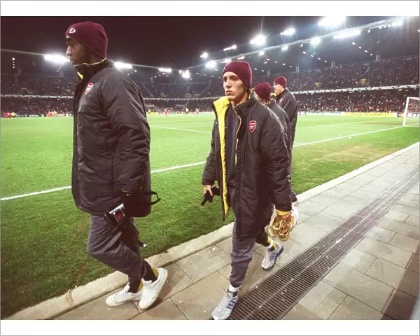 Arturo Lupoli (Arsenal) makes his way to the substitutes bench after half time