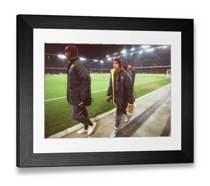 Framed Print : Arturo Lupoli (Arsenal) makes his way to the substitutes bench after half time