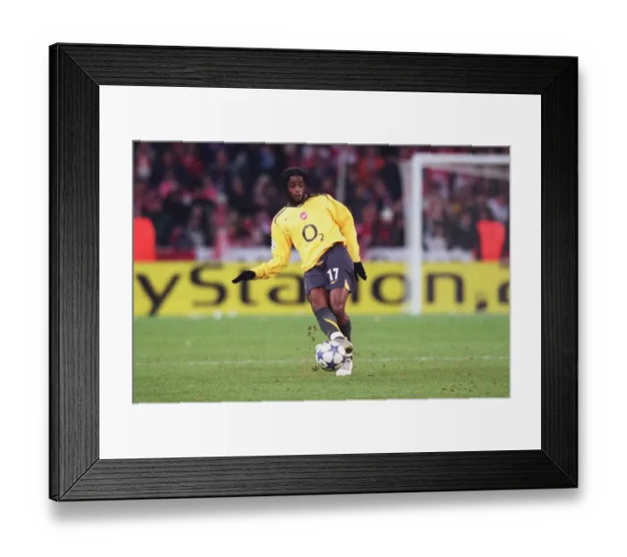 Framed Print : Alex Song's Victory: Arsenal FC Triumphs Over FC Thun in UEFA Champions League Group B Framed Print : Alex Song's Victory: Arsenal FC Triumphs Over FC Thun in UEFA Champions League Group B