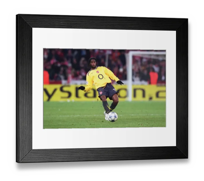 Framed Print : Alex Song (Arsenal). FC Thun 0: 1 Arsenal. UEFA Champions League Framed Print : Alex Song (Arsenal). FC Thun 0: 1 Arsenal. UEFA Champions League