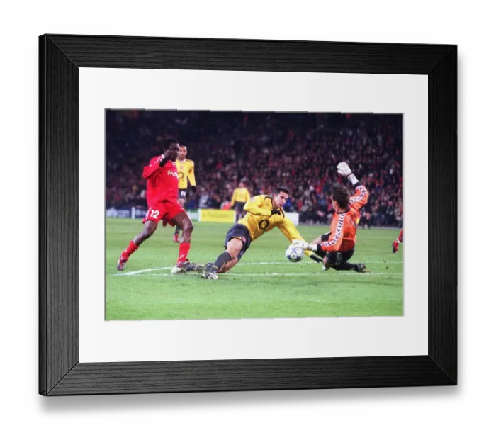 Framed Print : Robin van Persie (Arsenal) is fouled by Armand Orman (Thun)