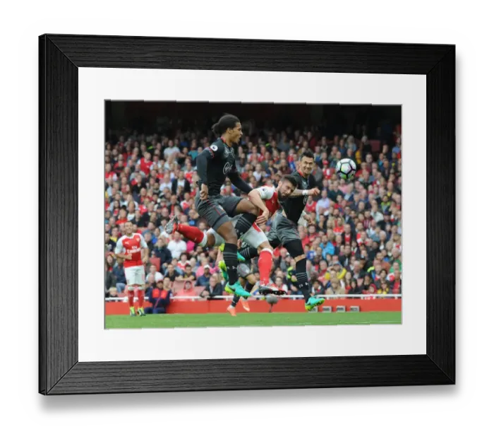 Framed Print : Giroud vs. Van Dijk & Fonte: Intense Face-Off at Arsenal's Emirates Stadium Framed Print : Giroud vs. Van Dijk & Fonte: Intense Face-Off at Arsenal's Emirates Stadium