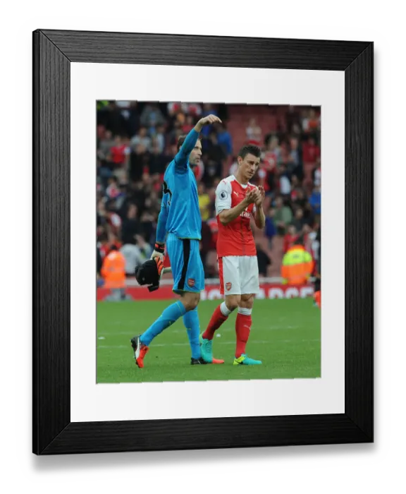 Framed Print : Arsenal's Cech and Koscielny Celebrate with Fans: Arsenal's Victory over Southampton (2016-17) Framed Print : Arsenal's Cech and Koscielny Celebrate with Fans: Arsenal's Victory over Southampton (2016-17)