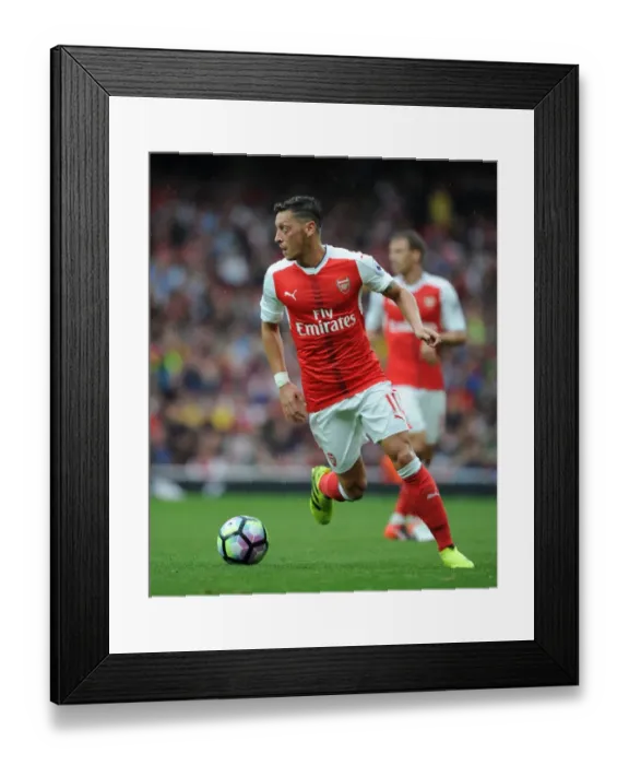 Framed Print : LONDON, ENGLAND - SEPTEMBER 10: Mesut Ozil of Arsenal during the Premier League match between Arsenal Framed Print : LONDON, ENGLAND - SEPTEMBER 10: Mesut Ozil of Arsenal during the Premier League match between Arsenal
