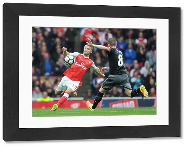 Arsenal vs Southampton: Mustafi Tackles Davis in Intense Premier League Showdown (2016-17)