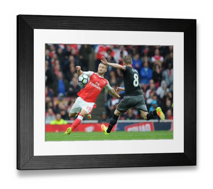 Framed Print : Arsenal vs Southampton: Mustafi Tackles Davis in Intense Premier League Showdown (2016-17)