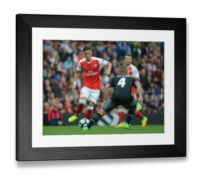 Framed Print : Arsenal's Ozil vs. Southampton's Clasie: A Battle in the 2016-17 Premier League Framed Print : Arsenal's Ozil vs. Southampton's Clasie: A Battle in the 2016-17 Premier League