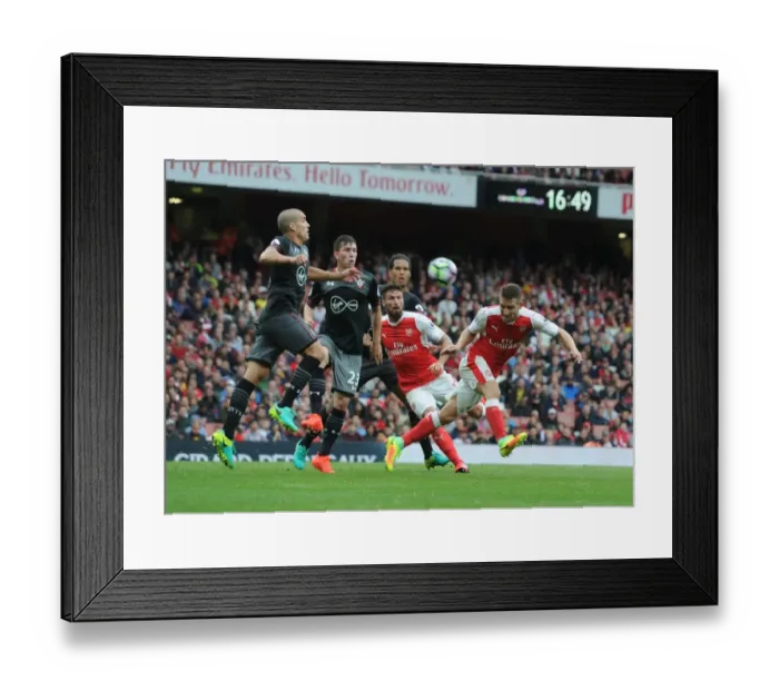 Framed Print : Arsenal's Mustafi Stands Firm Against Southampton's Romeu and Fonte