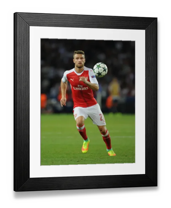Framed Print : Mustafi in Action: Arsenal vs. Paris Saint-Germain, UEFA Champions League 2016-17